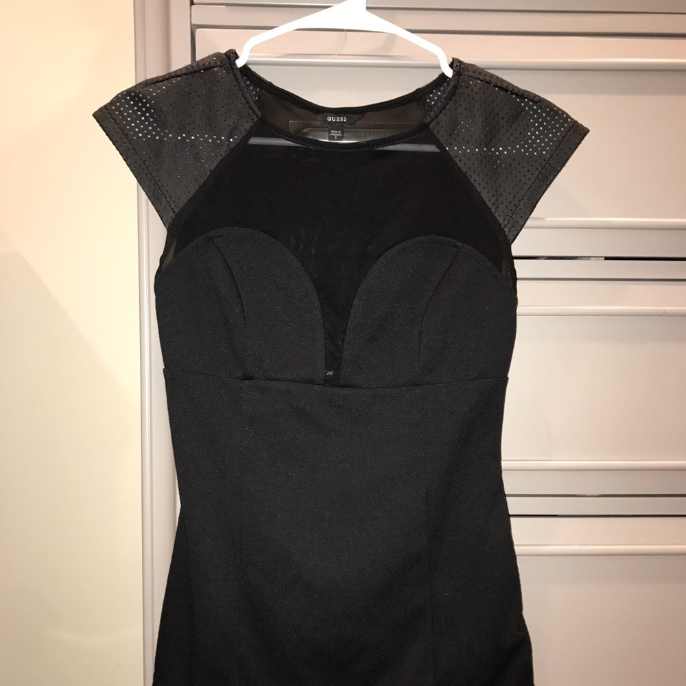 Never worn beautiful black guess top with mesh!